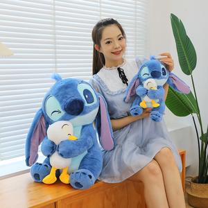Peluche Stitch con patito 60cm - 116525