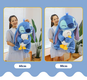 Peluche Stitch con patito 60cm - 116525